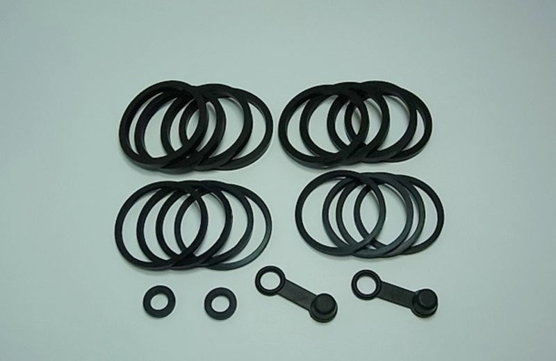 Reparaturkit Bremssattel vorn TOURMAX Honda
